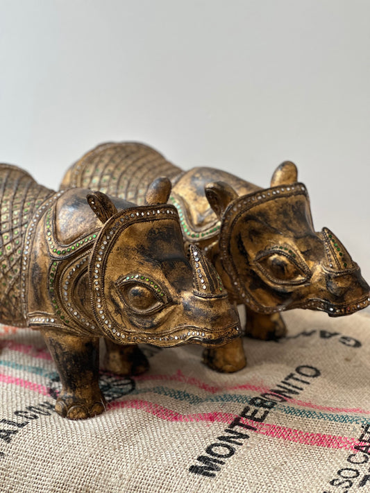 Pair of Large Indian Rhinos with beaded inlays.